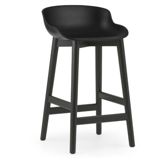 Normann Copenhagen Hyg black oak bar stool with polypropylene seat h. 25 2/3 in. Normann Copenhagen Hyg Black - Buy now on ShopDecor - Discover the best products by NORMANN COPENHAGEN design
