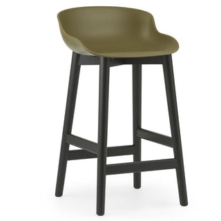 Normann Copenhagen Hyg black oak bar stool with polypropylene seat h. 25 2/3 in. Normann Copenhagen Hyg Olive - Buy now on ShopDecor - Discover the best products by NORMANN COPENHAGEN design