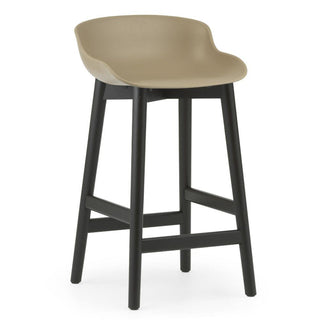 Normann Copenhagen Hyg black oak bar stool with polypropylene seat h. 25 2/3 in. Normann Copenhagen Hyg Sand - Buy now on ShopDecor - Discover the best products by NORMANN COPENHAGEN design