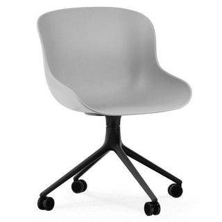 Normann Copenhagen Hyg polypropylene swivel chair with 4 wheels, black aluminium legs Normann Copenhagen Hyg Grey - Buy now on ShopDecor - Discover the best products by NORMANN COPENHAGEN design