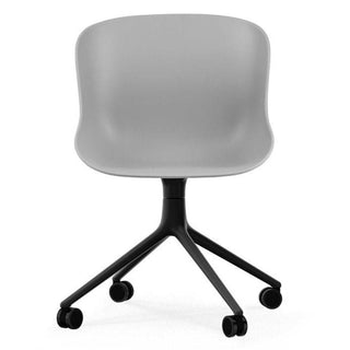 Normann Copenhagen Hyg polypropylene swivel chair with 4 wheels, black aluminium legs - Buy now on ShopDecor - Discover the best products by NORMANN COPENHAGEN design